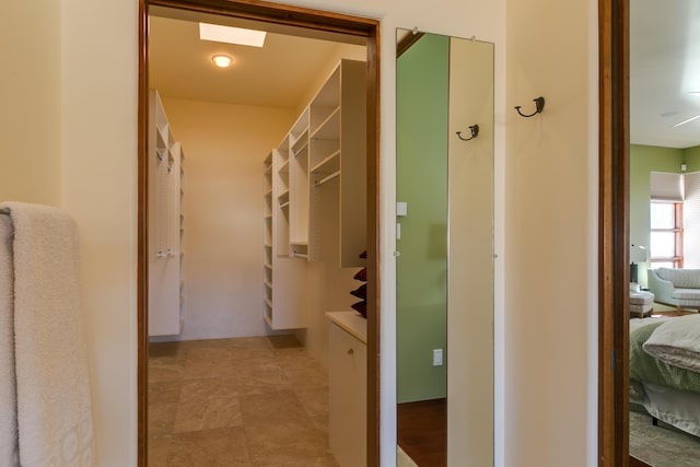 hallway with a skylight