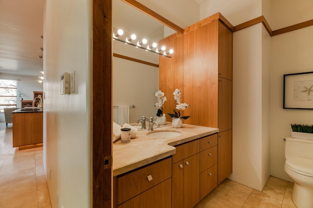 927 Camino Vista Rio, Bernalillo, NM 87004 - bathroom with toilet, tile patterned floors, and vanity
