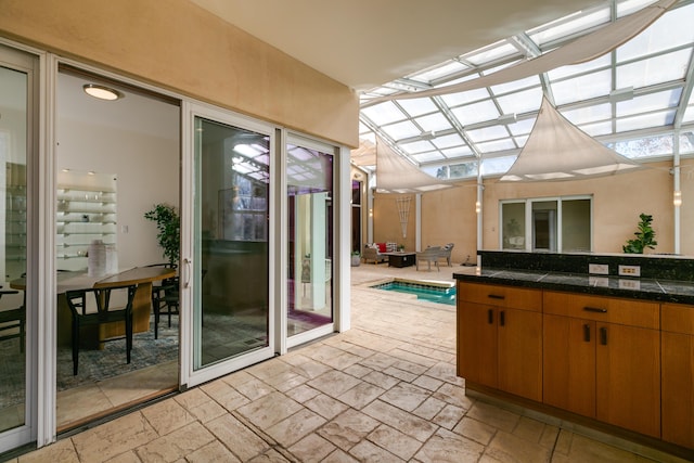927 Camino Vista Rio, Bernalillo, NM 87004 - sunroom / solarium featuring a skylight