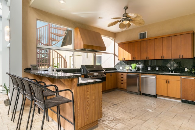 927 Camino Vista Rio, Bernalillo, NM 87004 - kitchen featuring refrigerator, a sink, a peninsula, decorative backsplash, and healthy amount of natural light