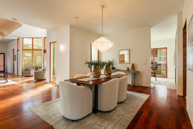 927 Camino Vista Rio, Bernalillo, NM 87004 - dining space with dark wood-style floors and a chandelier