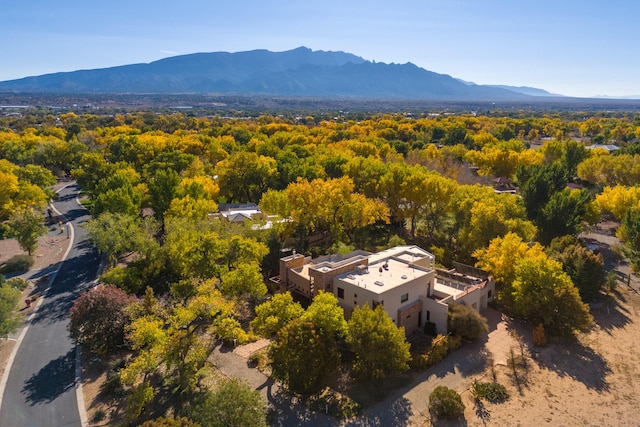 927 Camino Vista Rio, Bernalillo, NM 87004 - aerial view of property and surrounding area featuring a mountain backdrop and a forest