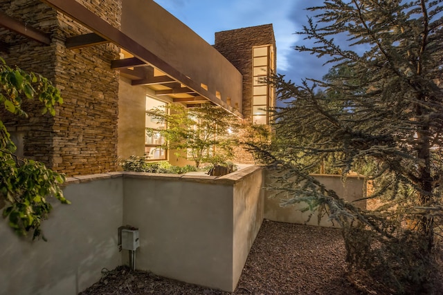 view of home's exterior with stone siding