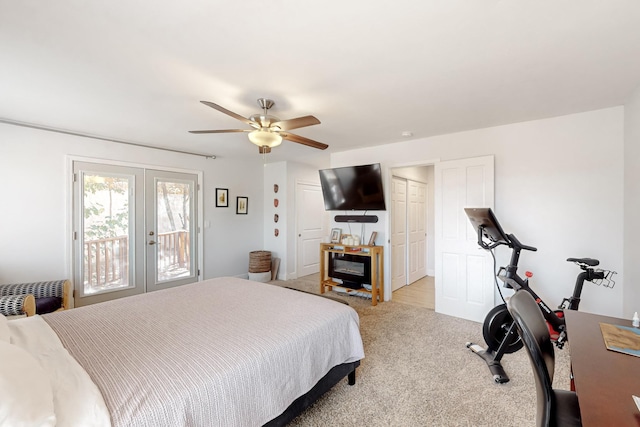 bedroom featuring ceiling fan, carpet floors, french doors, and access to exterior