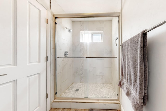 full bath featuring a stall shower