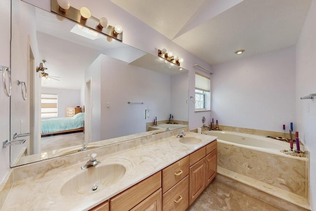 bathroom with a sink, ensuite bath, double vanity, and a bath