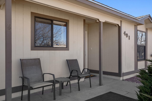 entrance to property featuring a patio