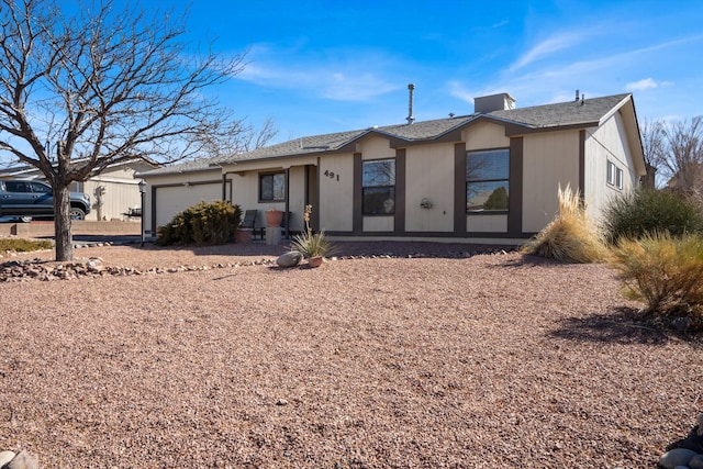 single story home with an attached garage