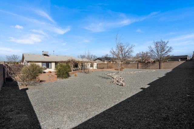 view of yard featuring a fenced backyard