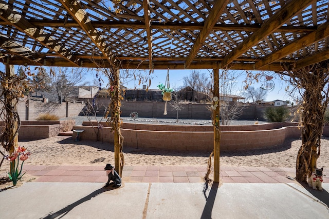 view of patio with fence and volleyball court