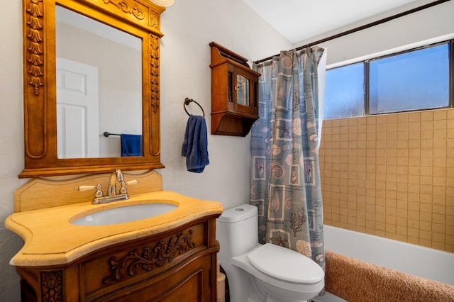 bathroom with shower / bathtub combination with curtain, toilet, and vanity