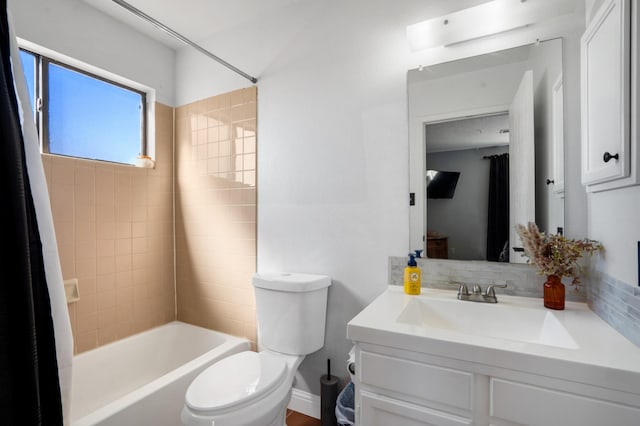 bathroom with vanity, toilet, and bathing tub / shower combination