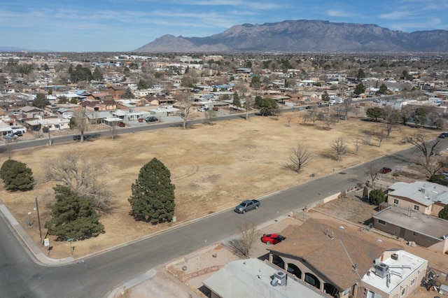 bird's eye view with a residential view and a mountain view