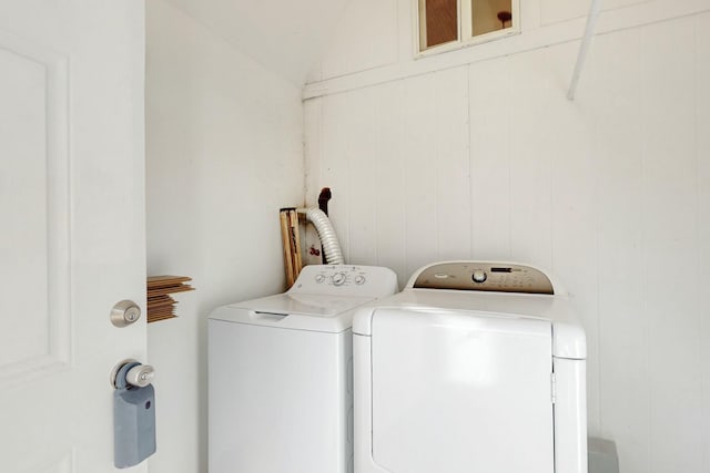 washroom featuring laundry area and washer and dryer