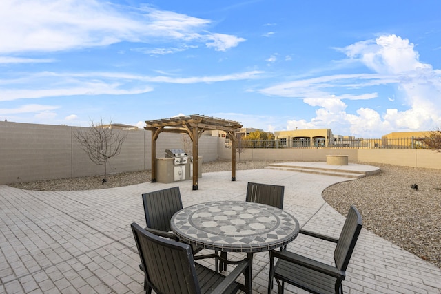 view of patio featuring outdoor dining area, grilling area, a fenced backyard, and a pergola