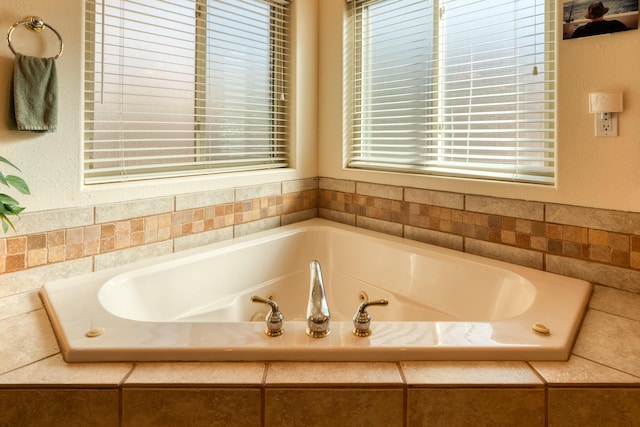 full bath featuring a whirlpool tub