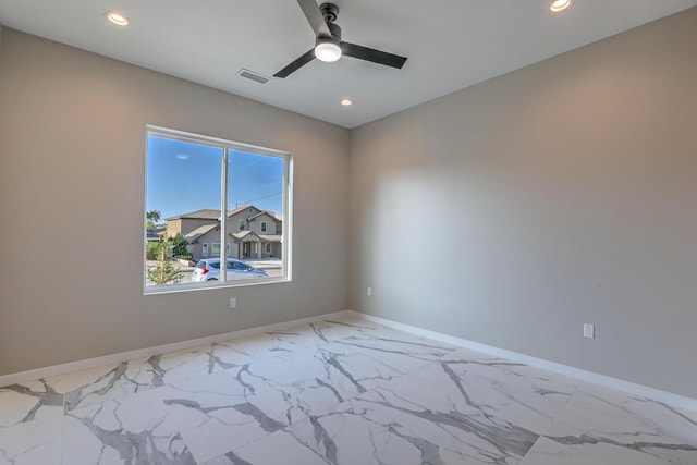 spare room with recessed lighting, visible vents, ceiling fan, and baseboards