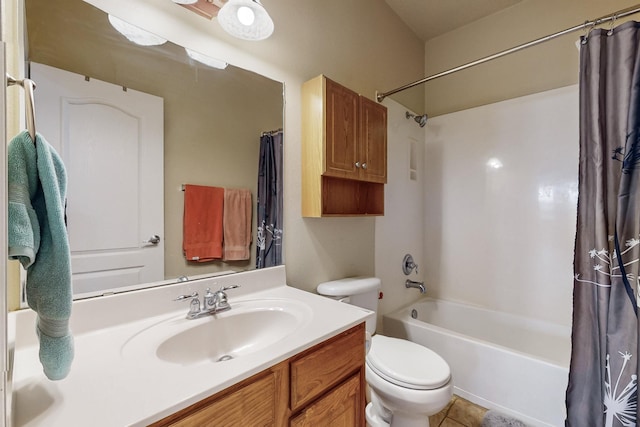 bathroom featuring tile patterned floors, toilet, shower / bath combo, and vanity