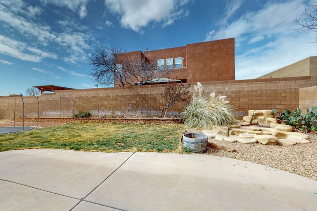 view of yard with a patio area and a fenced backyard