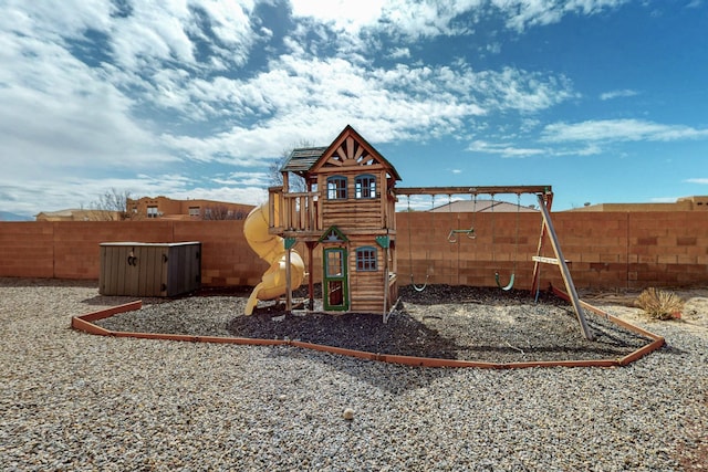 view of playground featuring a fenced backyard