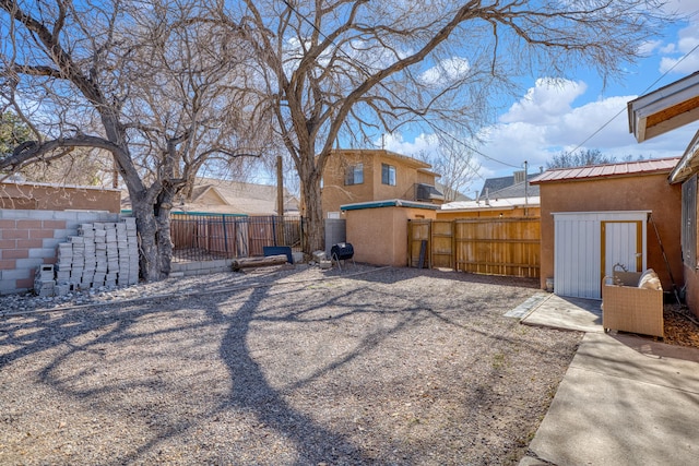 view of yard featuring a fenced backyard and a patio