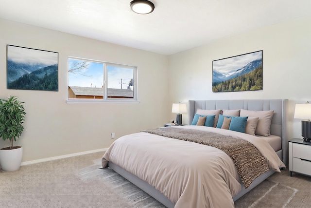 carpeted bedroom with baseboards