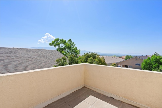 balcony featuring a mountain view