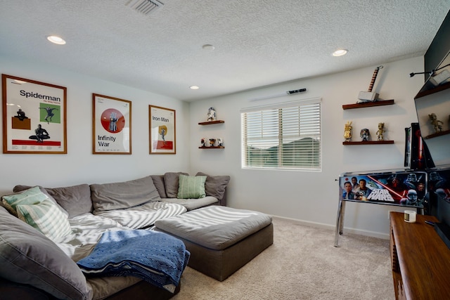 carpeted living area with a textured ceiling, recessed lighting, visible vents, and baseboards