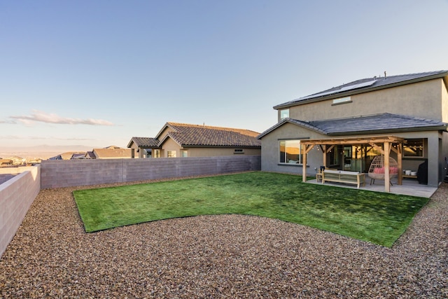 view of yard with a patio and a fenced backyard