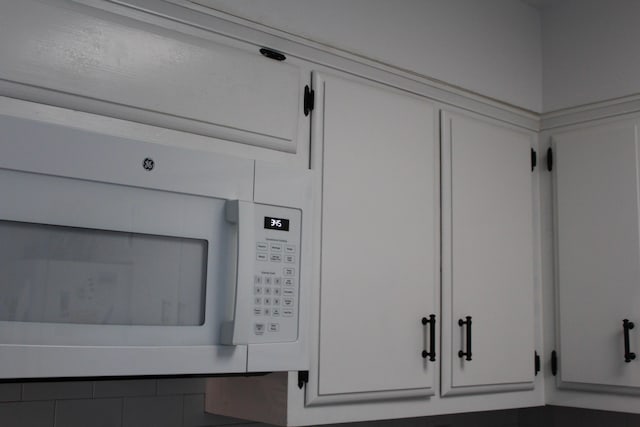 room details featuring white cabinets