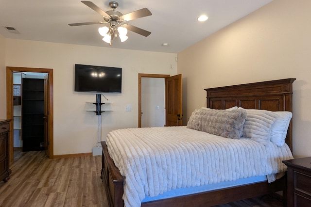 bedroom with visible vents, recessed lighting, light wood finished floors, baseboards, and ceiling fan