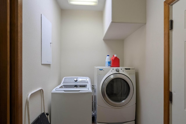 laundry area featuring laundry area and independent washer and dryer