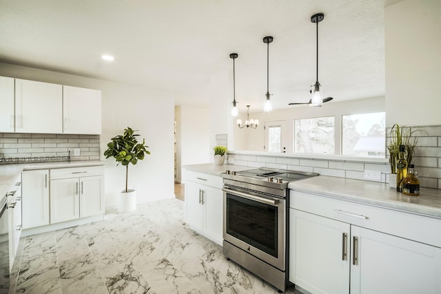 kitchen featuring marble finish floor, backsplash, white cabinetry, stainless steel electric range, and light countertops