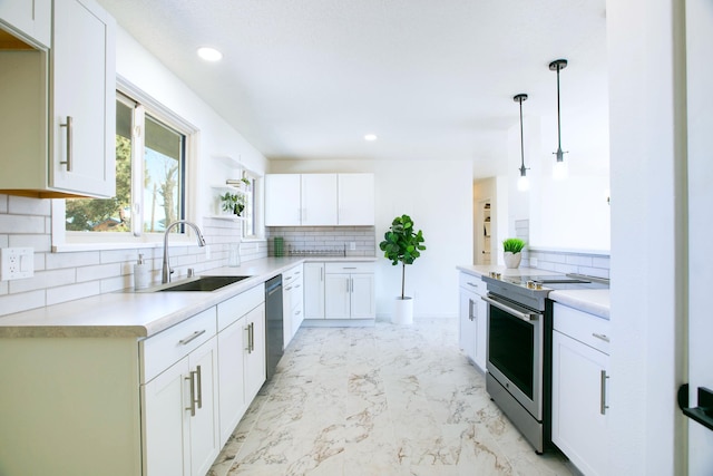 kitchen with stainless steel electric stove, a sink, light countertops, dishwasher, and marble finish floor