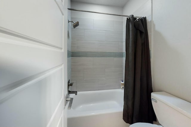 full bath featuring toilet and shower / tub combo