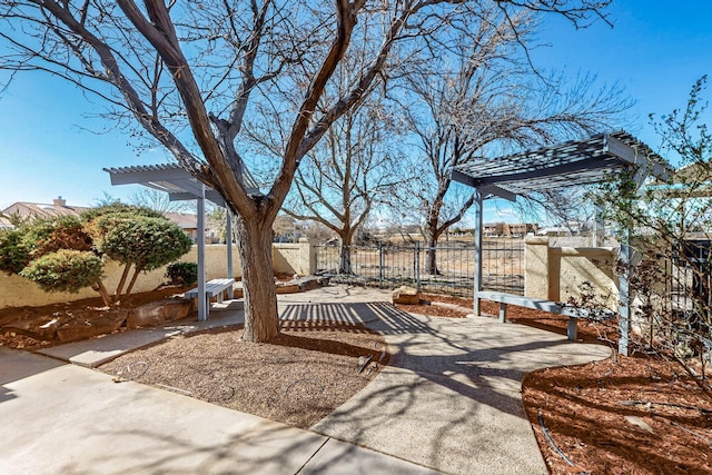 view of yard featuring a patio area and fence