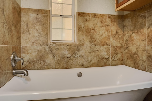 bathroom with a bathing tub