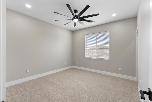 unfurnished room featuring a ceiling fan, recessed lighting, carpet, and baseboards