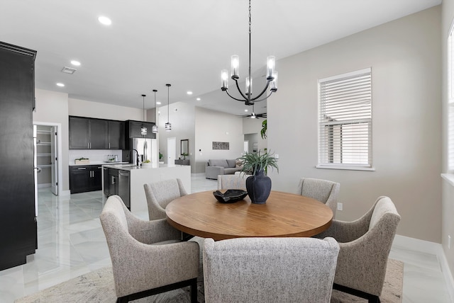 dining space with a chandelier, recessed lighting, visible vents, and baseboards