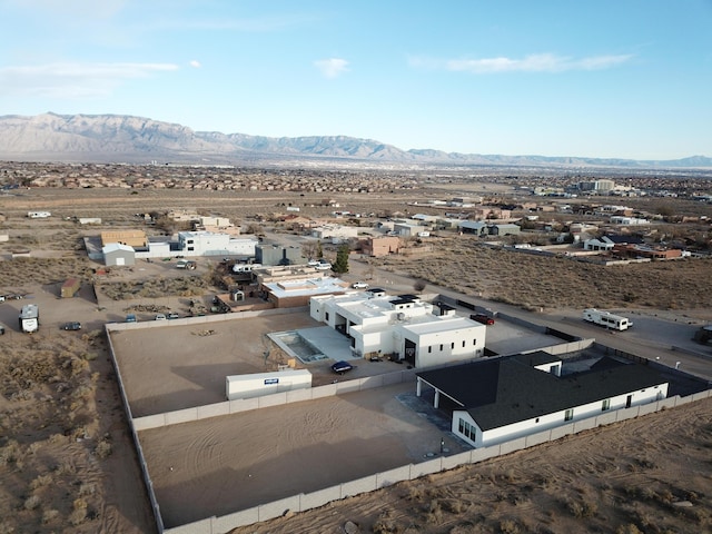 birds eye view of property featuring a mountain view