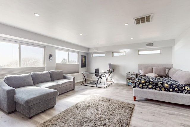 bedroom featuring recessed lighting, visible vents, baseboards, and wood finished floors