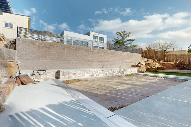 view of yard featuring a patio area and fence