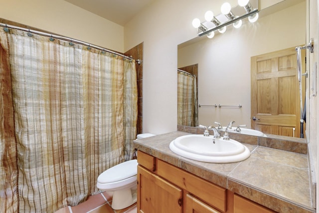 full bathroom featuring vanity and toilet