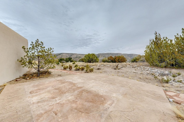 view of patio with a mountain view