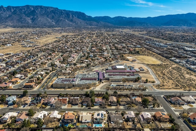 birds eye view of property featuring a residential view and a mountain view