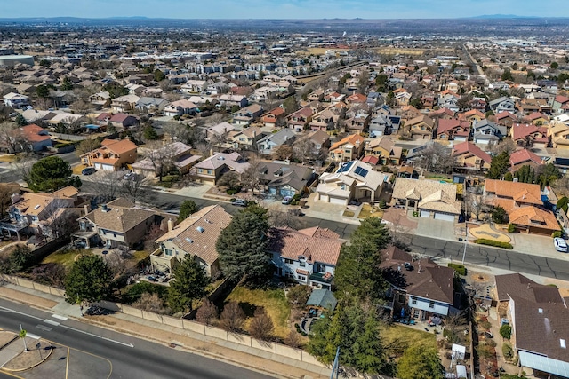 birds eye view of property with a residential view