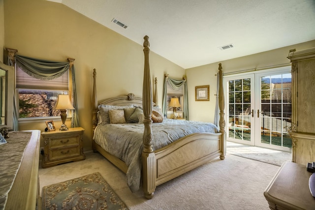 bedroom with lofted ceiling, access to exterior, visible vents, and light colored carpet