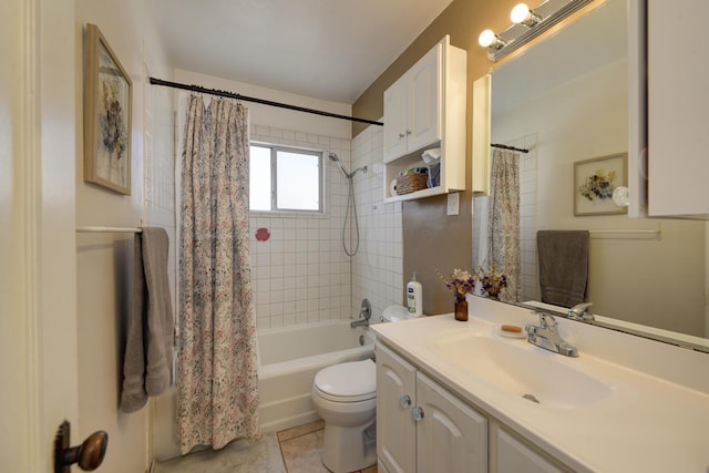 bathroom featuring toilet, tile patterned floors, shower / bathtub combination with curtain, and vanity