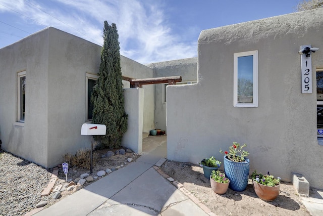 view of home's exterior with stucco siding