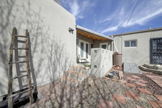 view of home's exterior with stucco siding